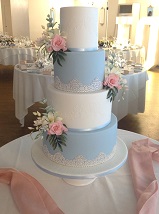 cornflower blue & white wedding cake & sugar flowers